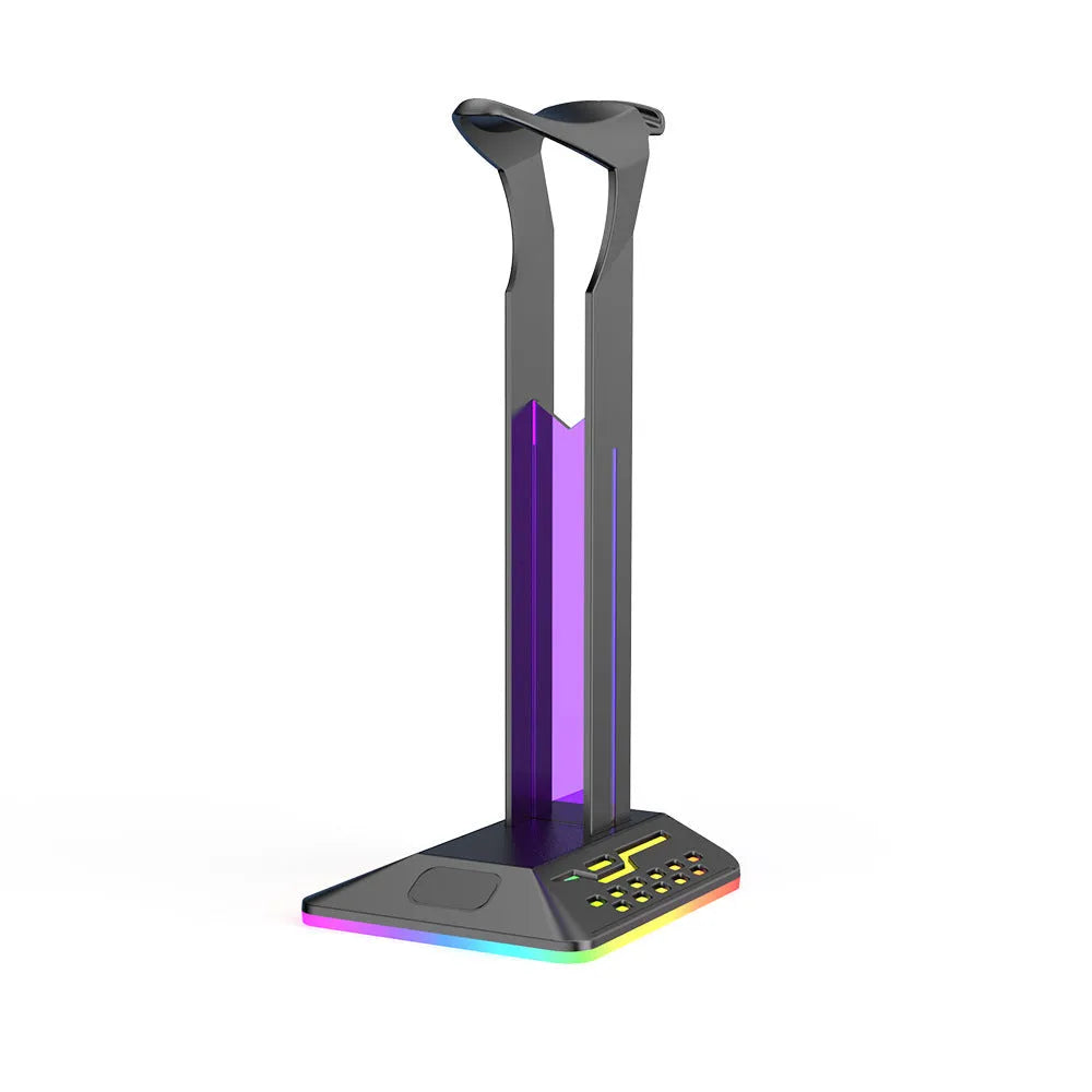 RGB colour changing headset bracket stand with dual USB ports on a desktop
