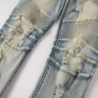 Light blue men's slim-fit distressed jeans with hand-frayed detailing and elastic stretch