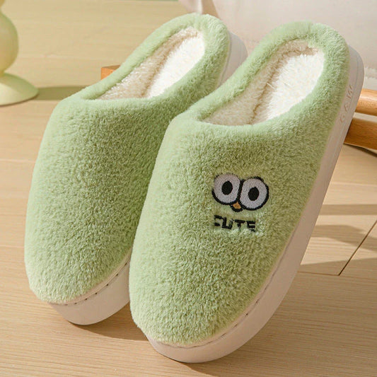 Stylish and cozy cartoon-inspired slippers with plush material and non-slip rubber soles, perfect for keeping feet warm and comfortable at home.