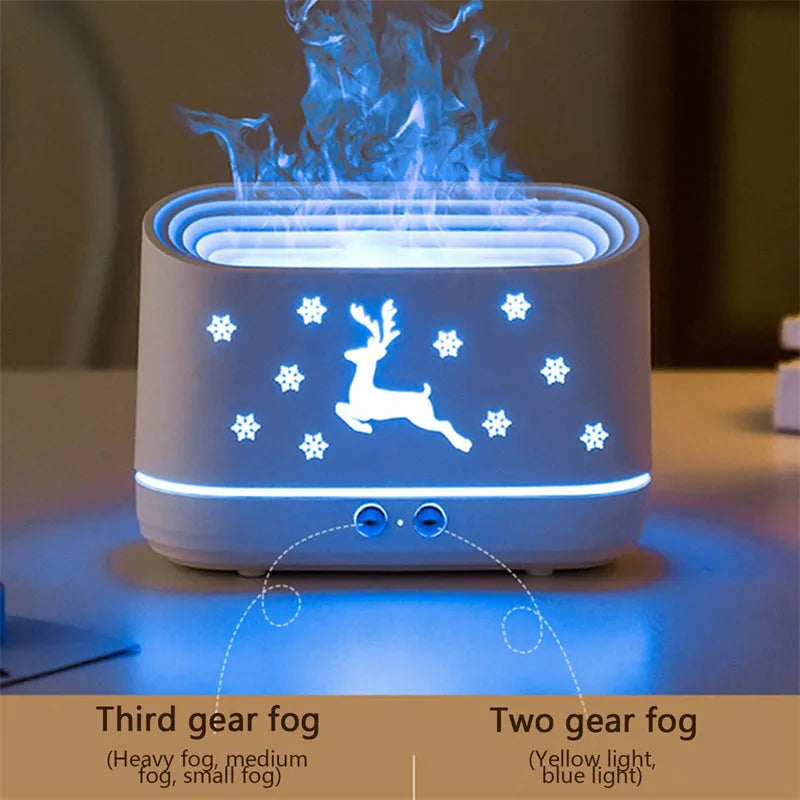 White round Elk flame effect humidifier and essential oil diffuser on a surface with mist and light on.