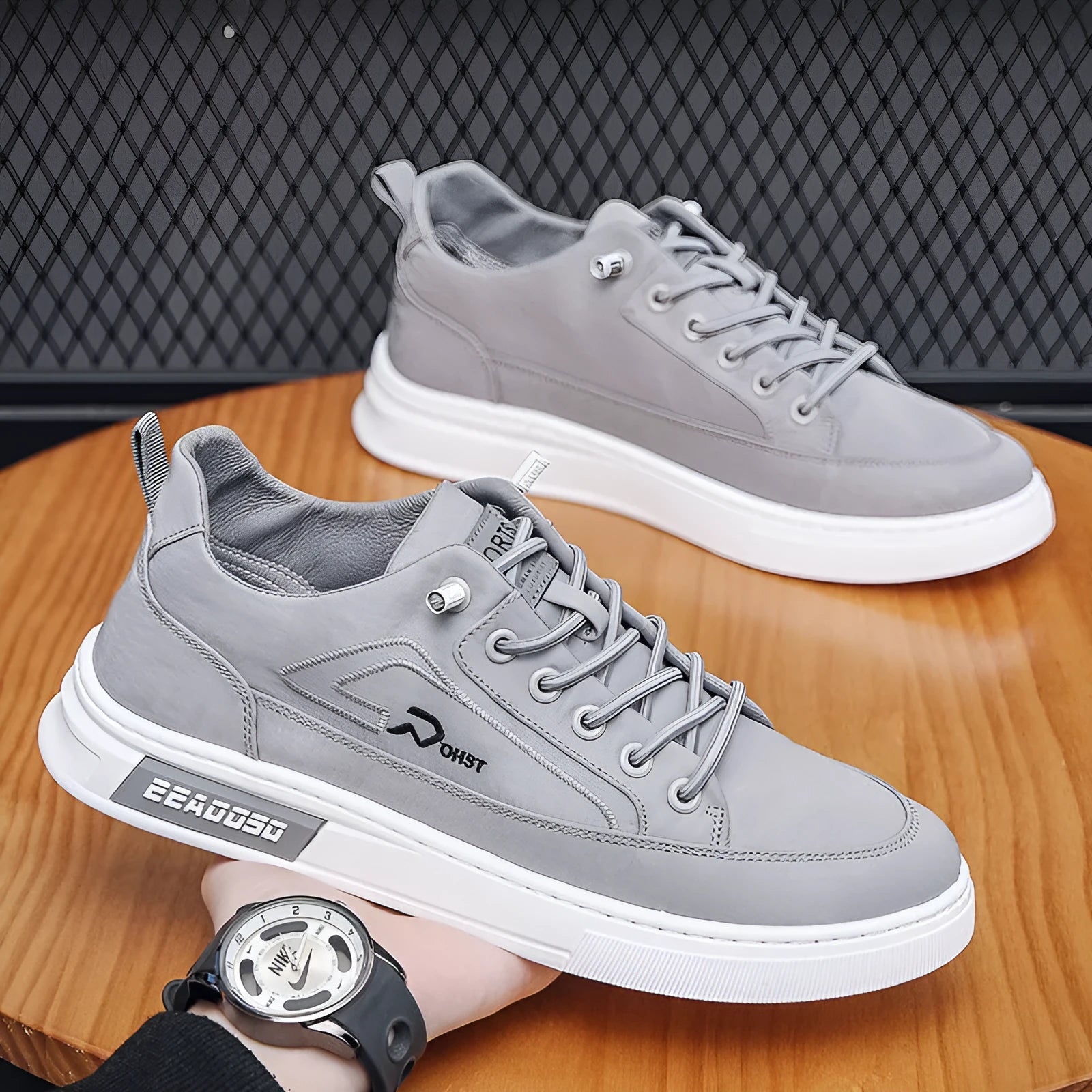 Gray men's canvas casual shoes with ice silk construction, leather lining, and rubber sole in low top design