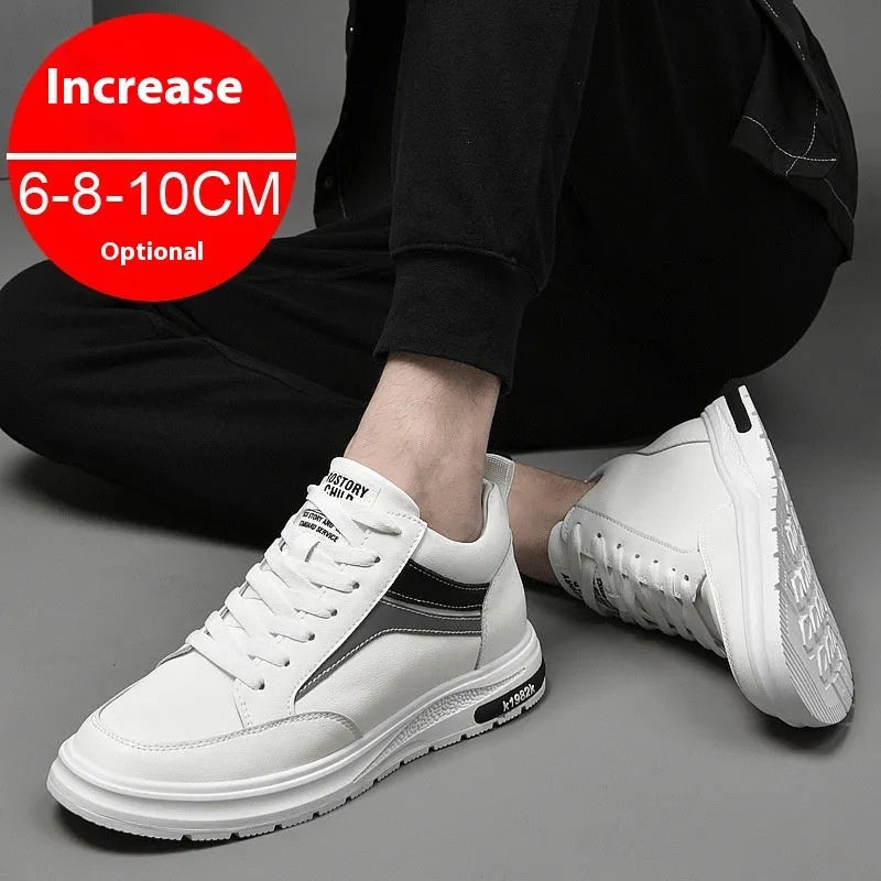 Men's white and black low-top casual sneakers with round toe and lace-up front, showcasing sewing line detail.