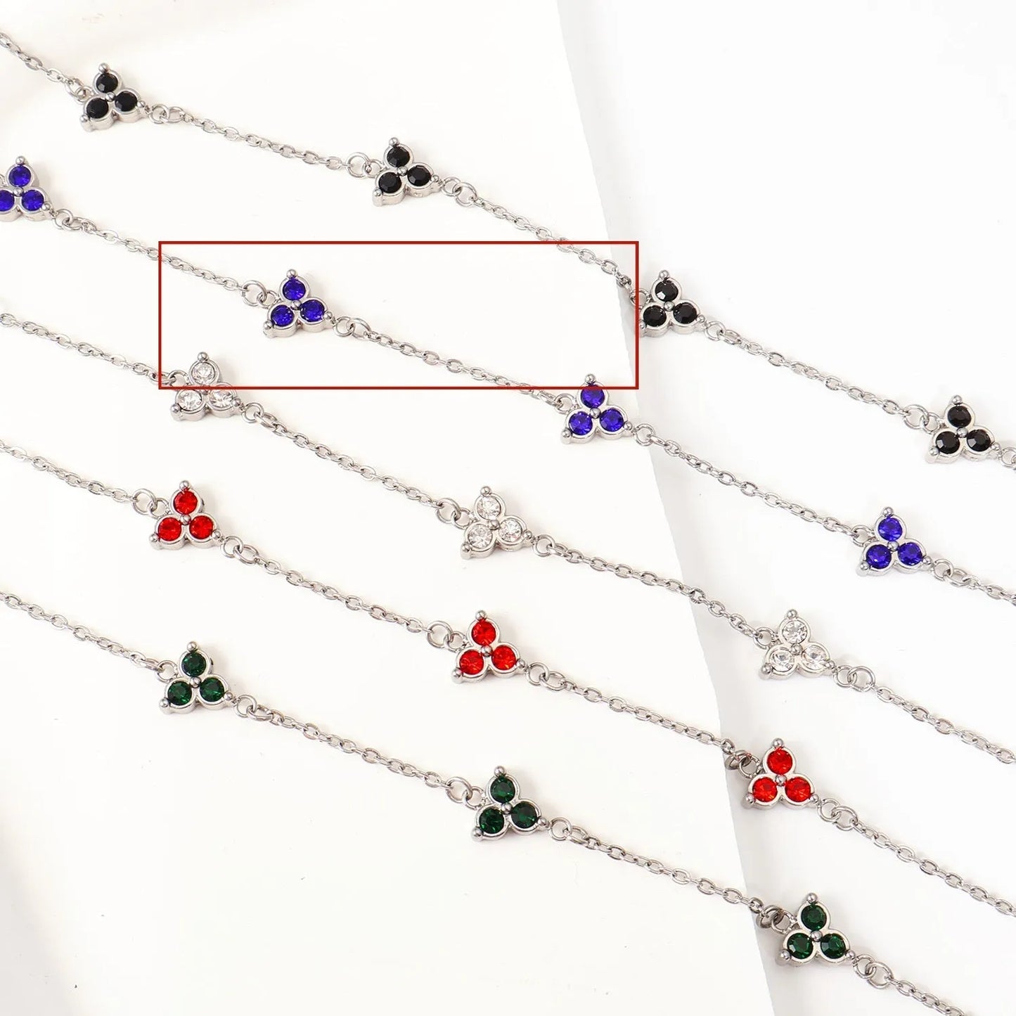 Women's stainless steel three diamond geometric triangular bracelet in gold finish with white zircon gemstones