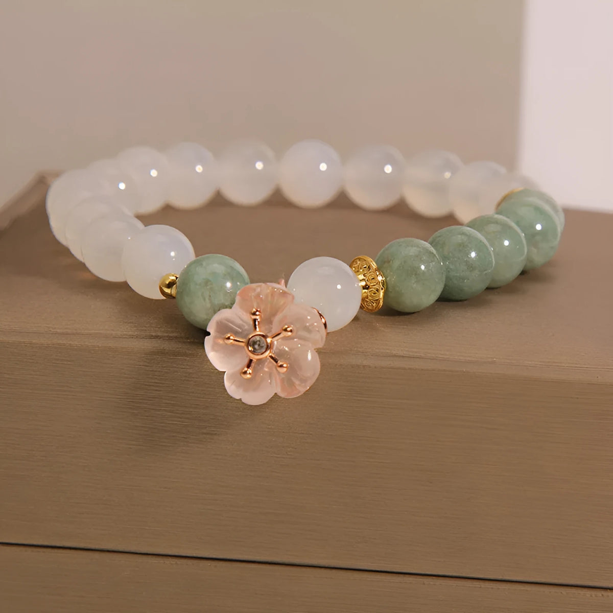 Women's floral jade agate crystal bracelet with white agate stones and pink accents