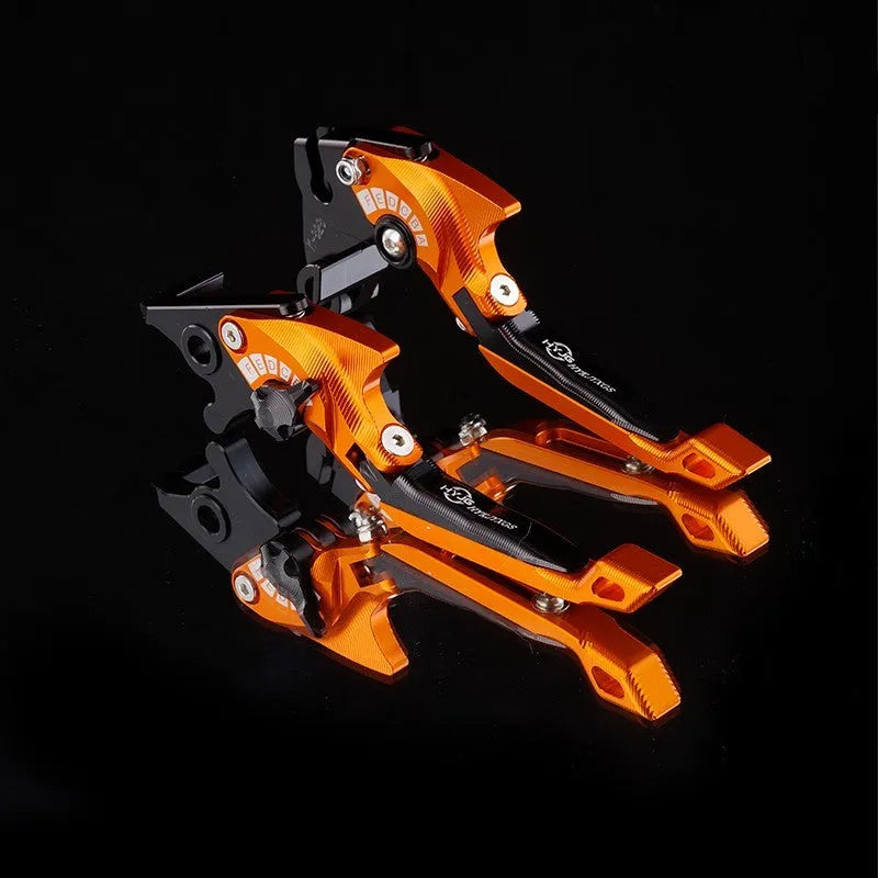 Pair of anodised metal bicycle brake horn handle levers with adjustable reach, shown in a two-tone colour finish.