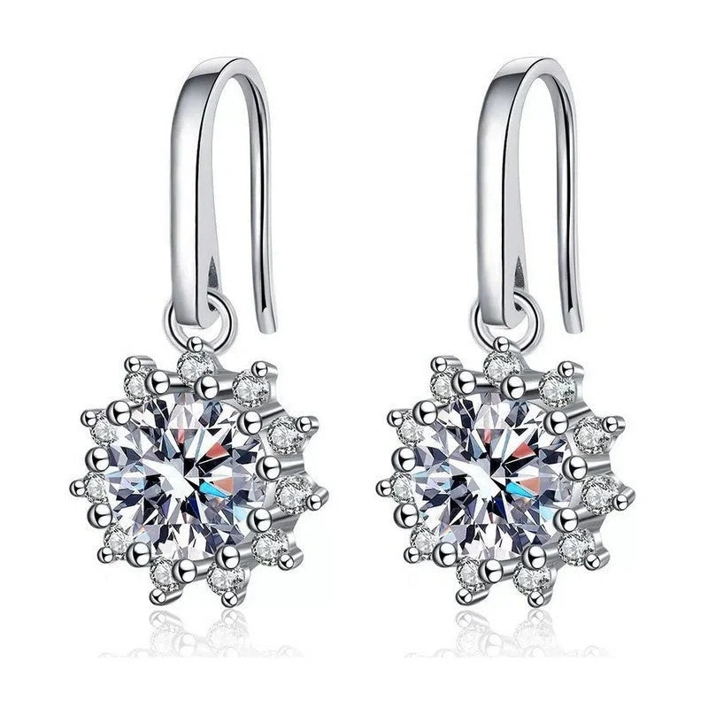 Elegant white gold sunflower stud earrings with a lustrous finish, a versatile accessory for the modern British woman