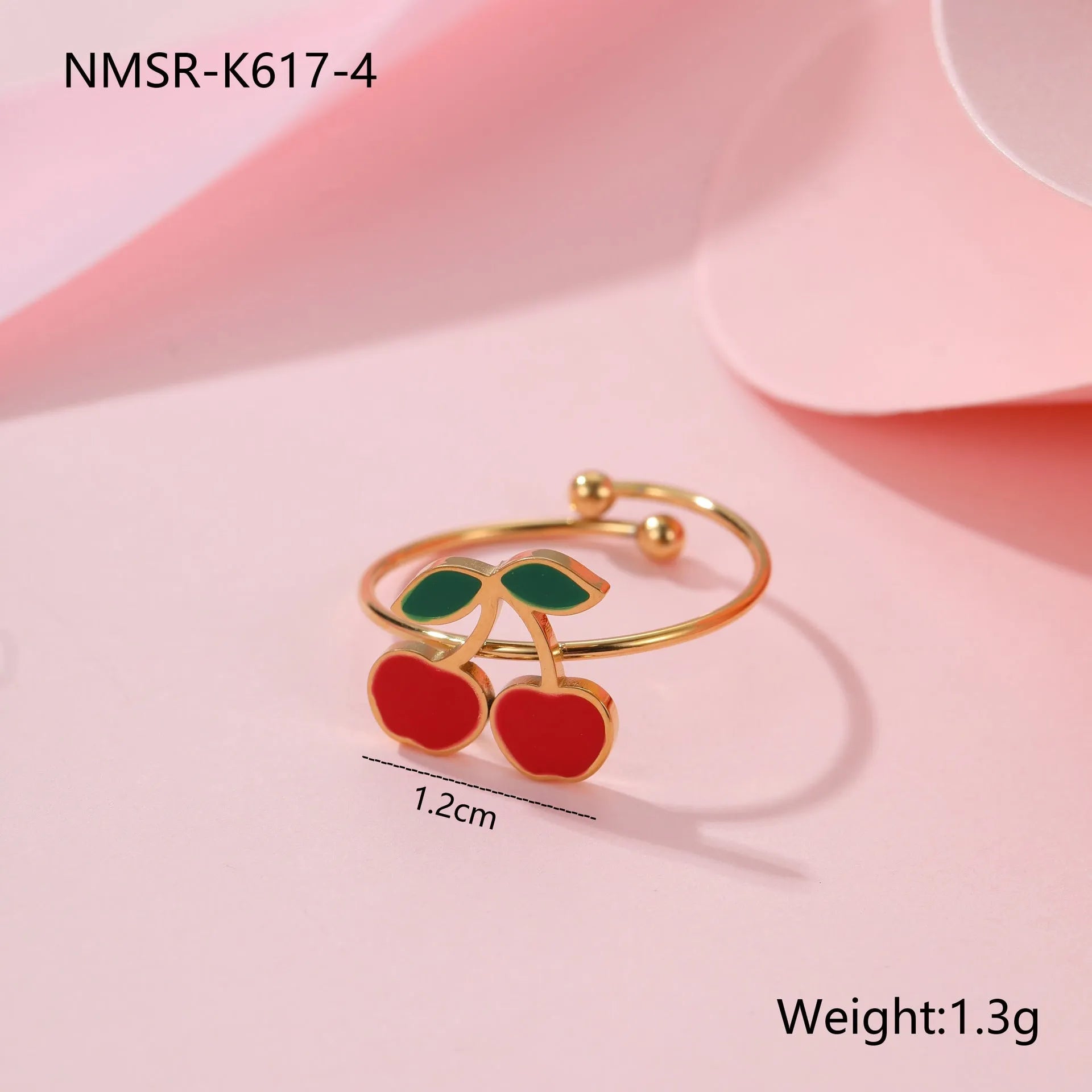 Cherry jewellery set with necklace, bracelet, earrings and ring in gold electroplated stainless steel with geometric fruit design