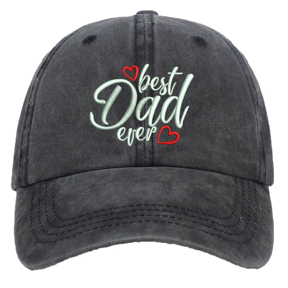 Washed cotton baseball cap with embroidered letters on dome crown, shown in adjustable fit.