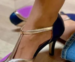 Women's round toe high heel shoe with button closure, shown in light blue pink colour.
