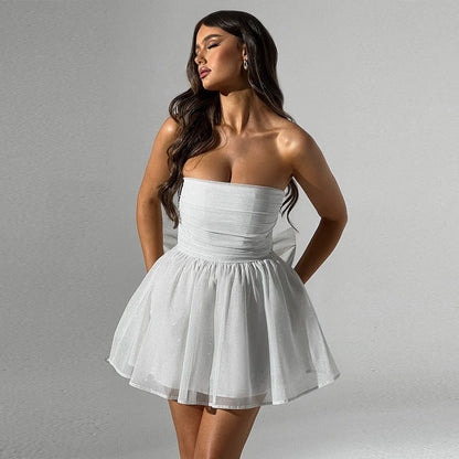 Elegant lace cocktail dress with graceful bow detail, available in various colours and sizes