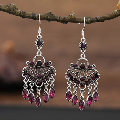 Purple drop-shaped alloy earrings with long fringe and crystal details on a retro style.