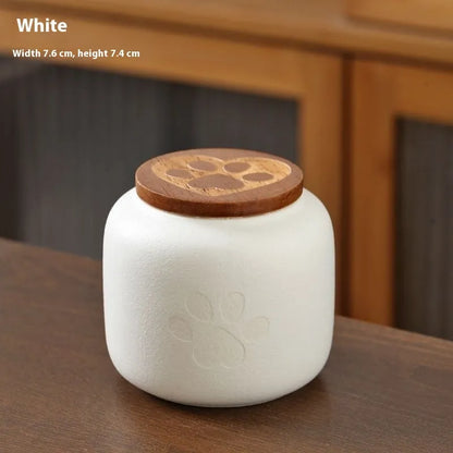 Ceramic pet funeral urn with foot print design in choice of colours and 180ml or 500ml sizes