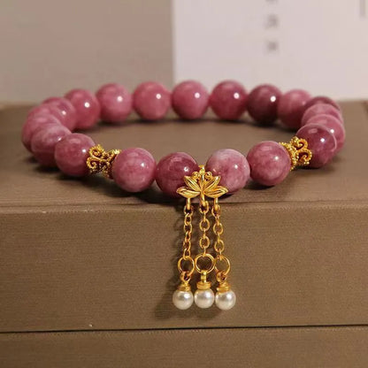 Pink lotus tassel natural stone bracelet with pearl pendant and flower charm.