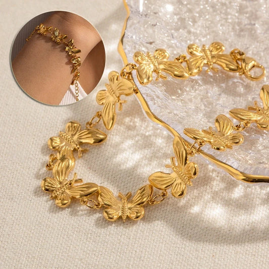 Elegant stainless steel bracelet with delicate butterfly design, available in a variety of fashionable colours