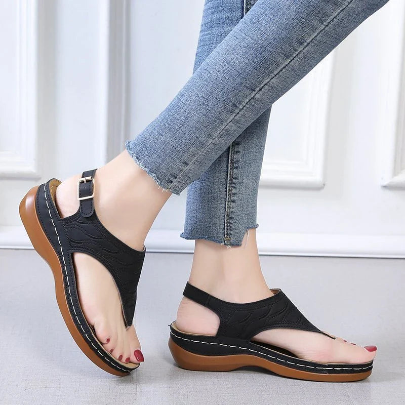 Comfortable women's wedge sandals in various colors with adjustable straps and a lightweight sole