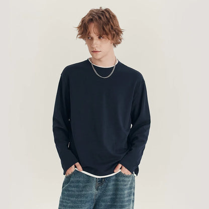 Men's loose long-sleeved cotton blend t-shirt in black, round neck, casual style.