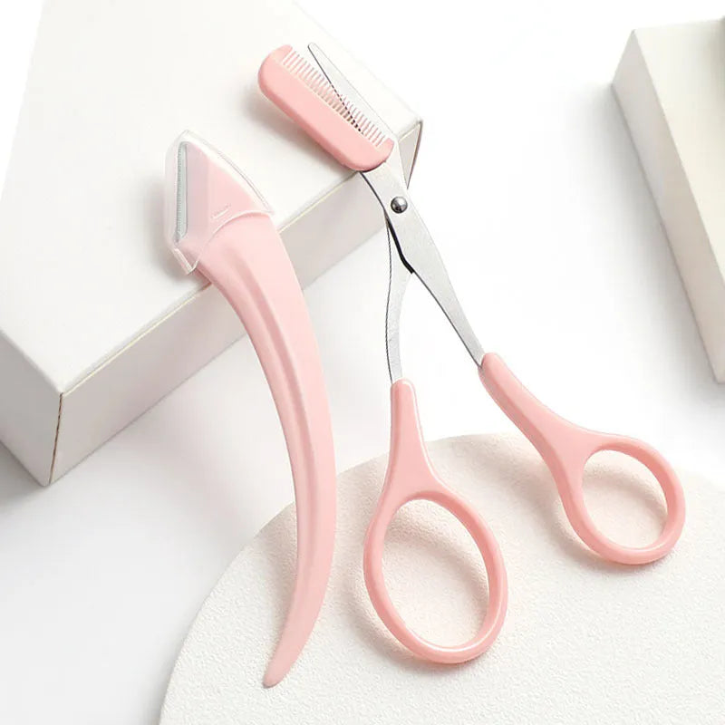 A curved moon-shaped eyebrow trimming knife and a cutting comb on a white background.