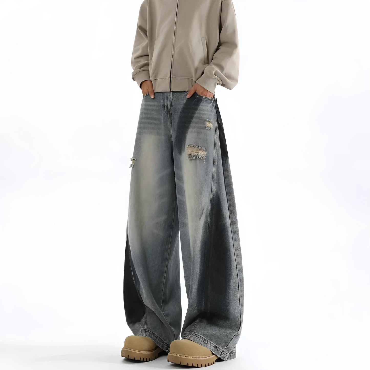 Men's blue ripped jeans with splash-ink distressing and loose fit