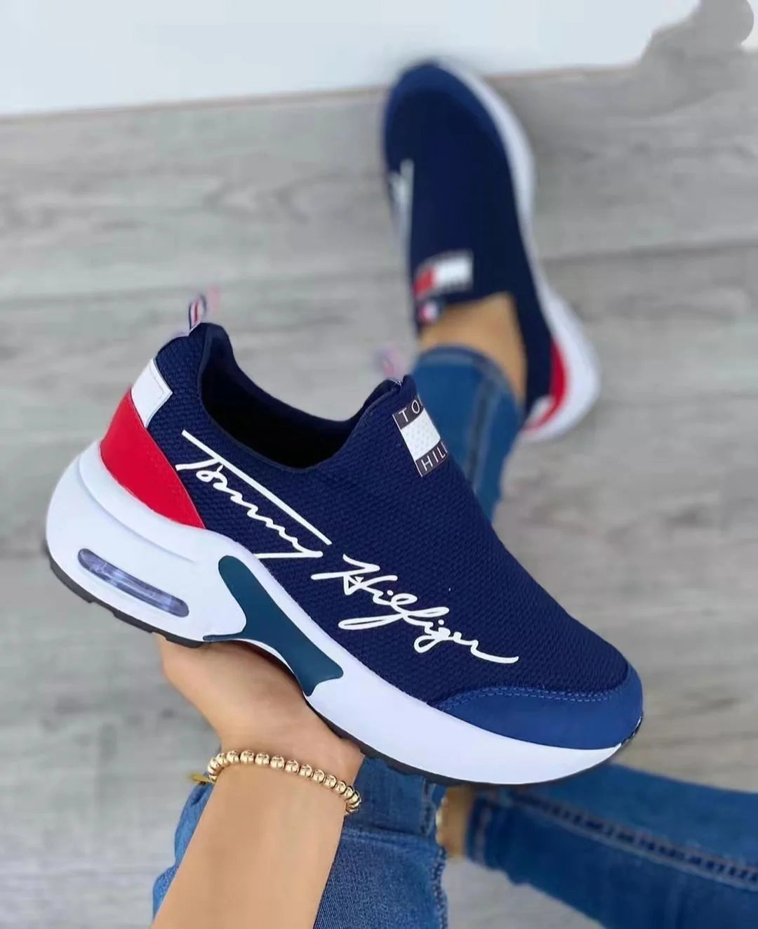 Women's slip-on sneakers with air cushion and mid heel in white, red, black, navy blue