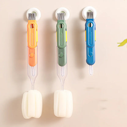 Five detachable cup brushes in blue, green, orange with 32cm handle and storage case