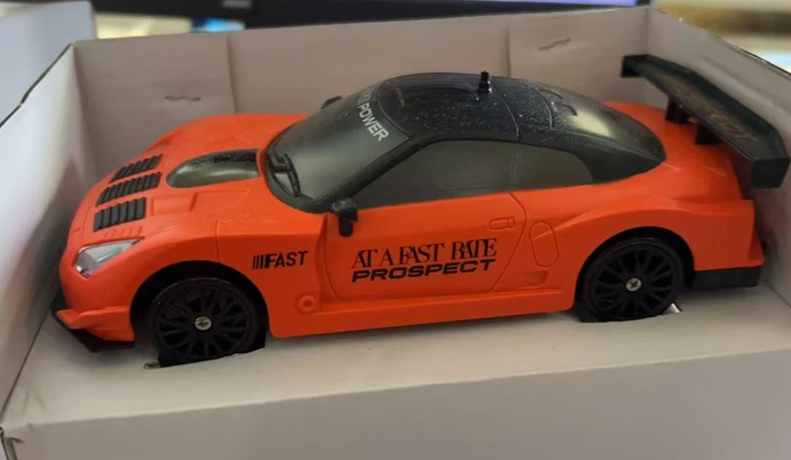 1:24 scale remote control drift car with powerful 4WD system, cool LED lights, and responsive 2.4 GHz remote for high-speed racing thrills