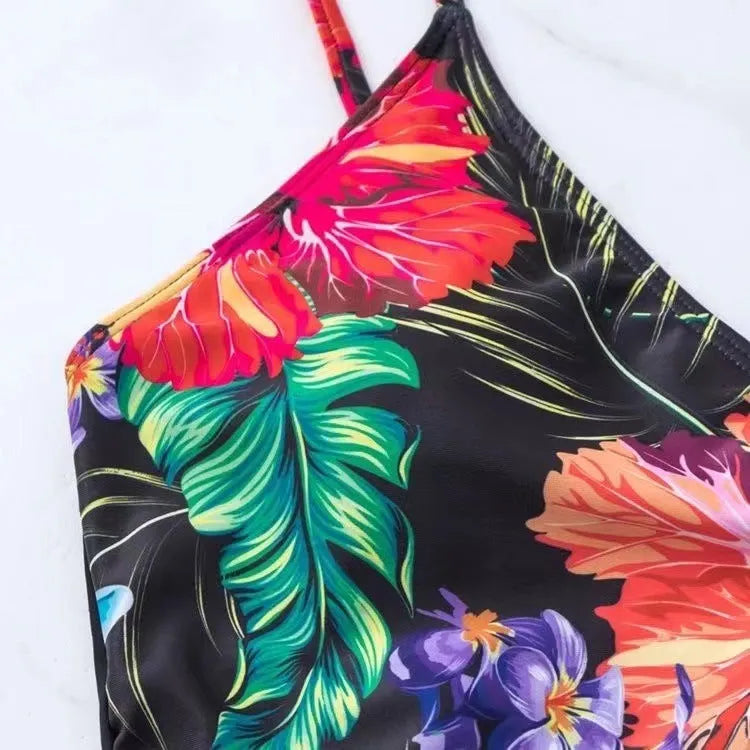 Black women's high waist briefs printed split leg bikini set for swimming and sports.