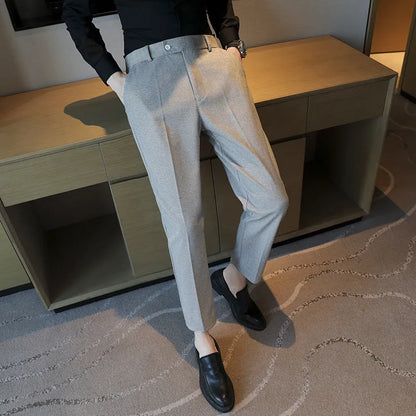 Straight-leg brown corduroy trousers with elastic waistband on size chart