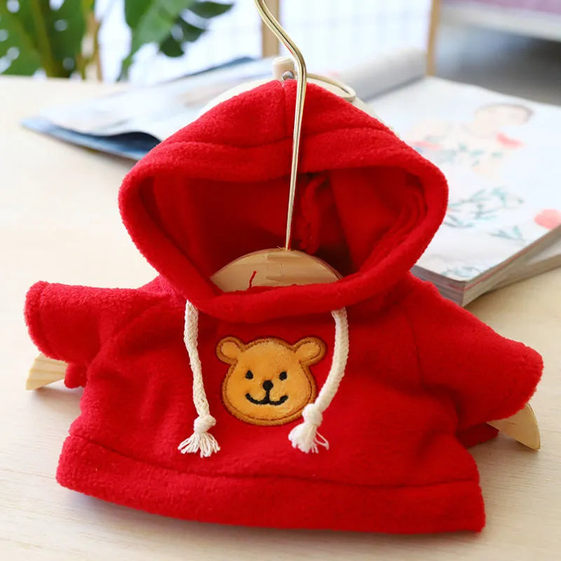 Cloth dog hoodie sweater in blue, shown in medium 23cm size on a small dog.