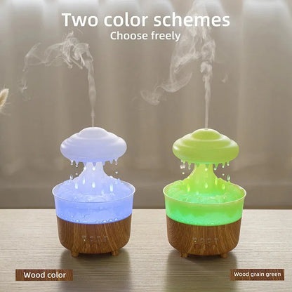 Wood grain rain cloud humidifier with LED lights and water drip feature on a table