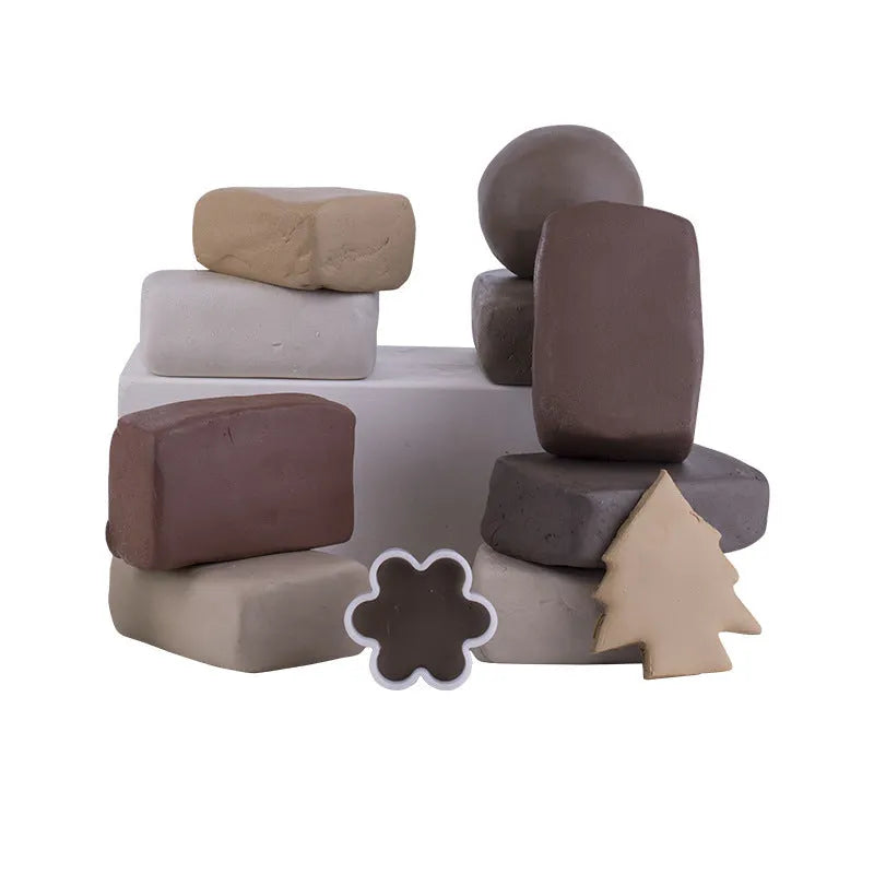 Polymer clay modelling set with twelve 500g colour blocks in a cartoon suitcase