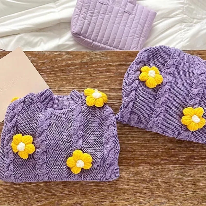 Purple flower print knitted dog clothing shown on small dog with size indicators