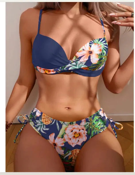 Women's printed two-piece bikini with push-up top and split hip briefs in various colours.