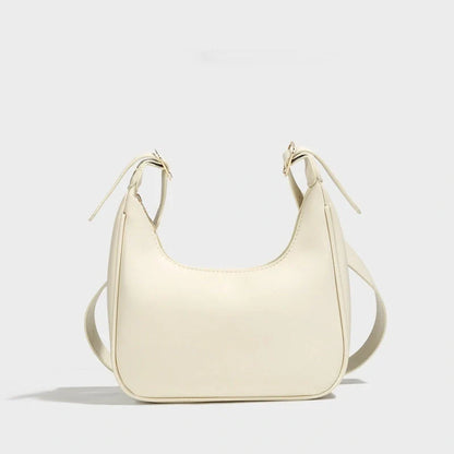 Stylish women's crossbody dumpling bag in soft PU with a crescent shape