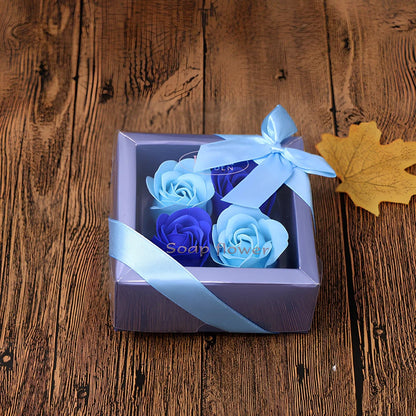Handmade soap flowers in red heart-shaped tin box measuring 12x12x5cm