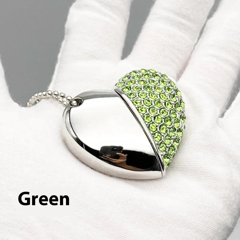 Blue heart-shaped USB flash drive with a brick-inlaid pattern on its metal surface.