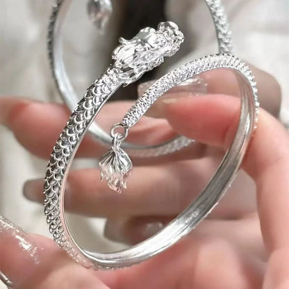 Adjustable Chinese dragon tail bangle with intricate relief design