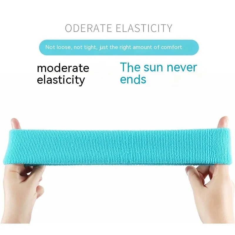 Widened solid colour sports sweatband in polyester and spandex, shown in one of five available colours.