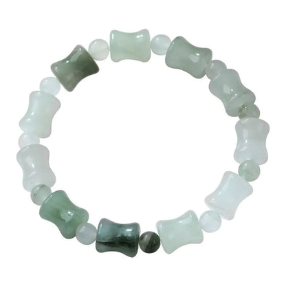 Simple Korean-style bracelet with natural chalcedony and coconut shell beads on an elastic string, showing the diamond-shaped safety lock.