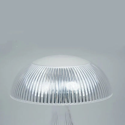 Small white acrylic USB rechargeable table lamp with a three-colour LED light.