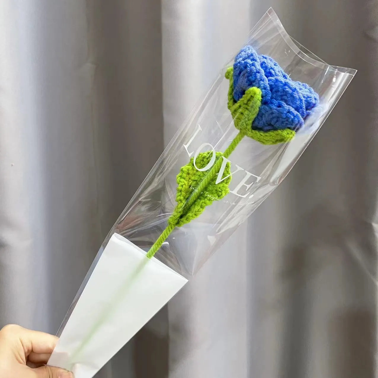 Wool-woven artificial silk rose bouquet in gradient blue colour with textured floral arrangement