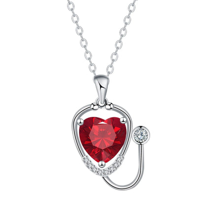 Women's fashion necklace with wings cross stethoscope pendant in red diamond colour