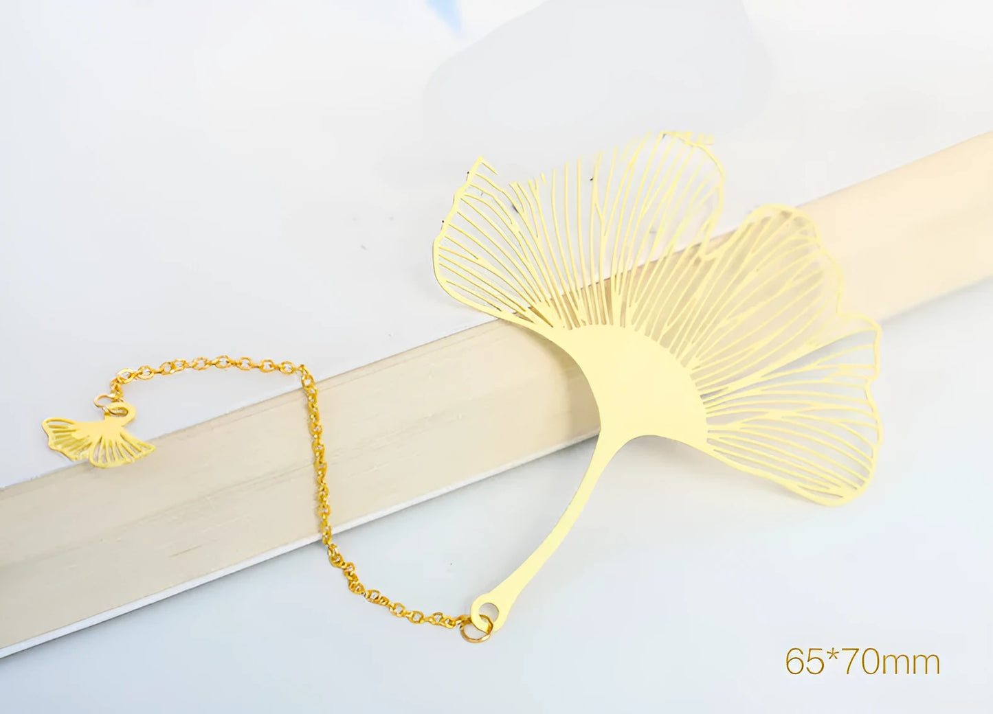 Brass metal bookmark with hollow plating leaf design and rose gold tassel decoration