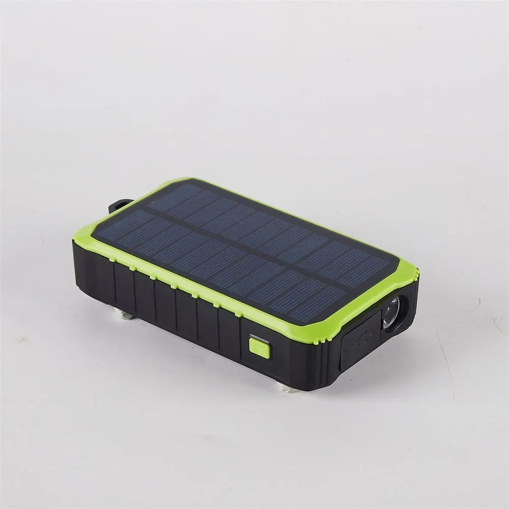 Orange and green portable solar power bank with hand crank, solar panel, and dual USB ports