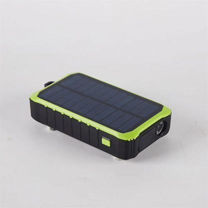 Orange and green portable solar power bank with hand crank, solar panel, and dual USB ports