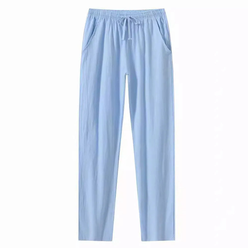 Cotton and linen beach trousers for men offer loose casual trousers designed for comfort and summer wear, available in multiple solid colours including white, sky blue, khaki, and black, in sizes from S to XXL with a standard trousers length