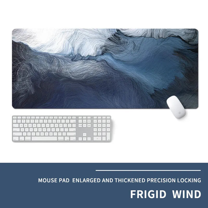 Oversized rectangular mouse pad with a printed design on a desk, next to a keyboard and mouse.