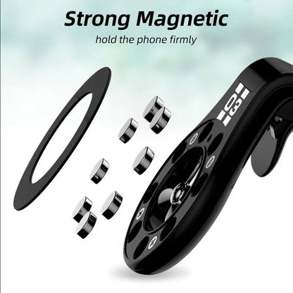 Black magnetic car phone holder attached to air vent with phone mounted and fragrance slice visible