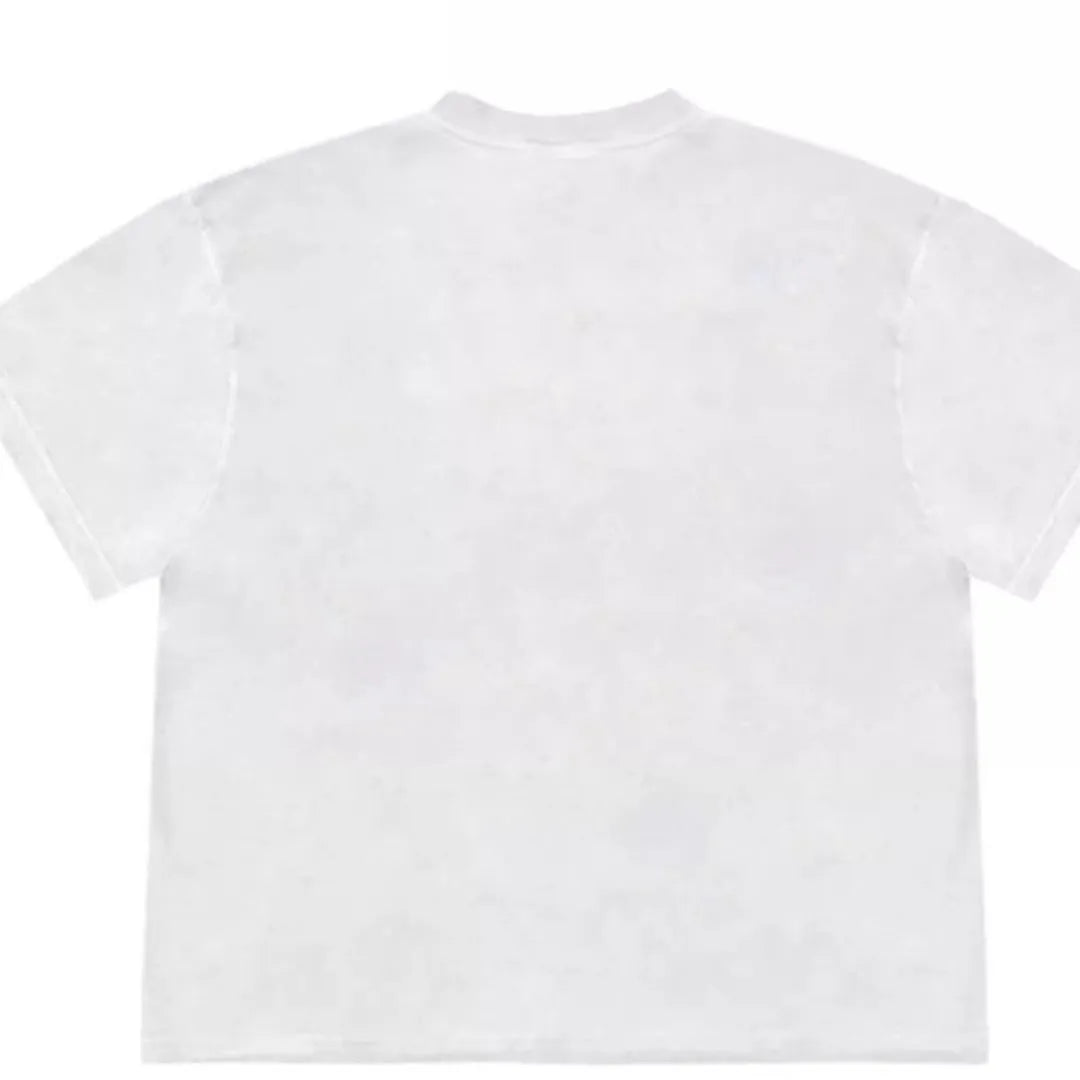 A loose-fit blueberry patchwork short-sleeve T-shirt on a hanger, showing plant and flower designs.