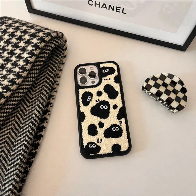 Black plush fairy design phone back cover for iPhone models including 13 Pro Max and 12 Pro.