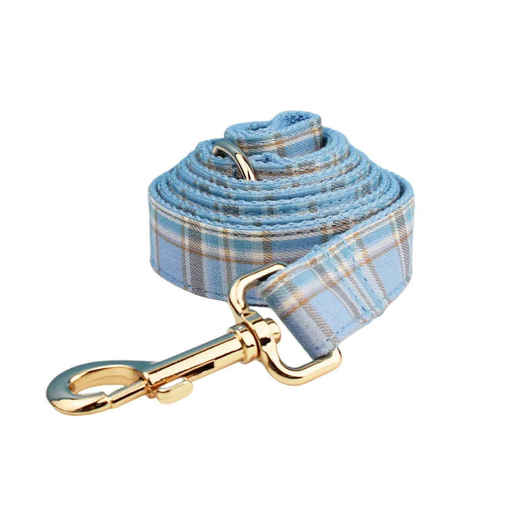 Sky blue grid forest pattern dog collar, leash, bow, and vest four-piece pet accessory set